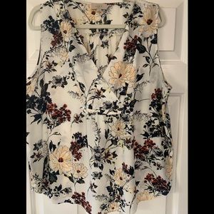 Floral print sleeveless blouse